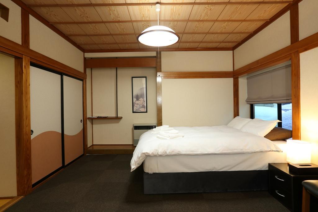 Snowlines Lodge Hakuba Habitación foto