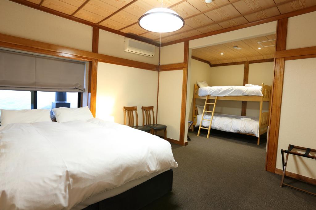 Snowlines Lodge Hakuba Habitación foto