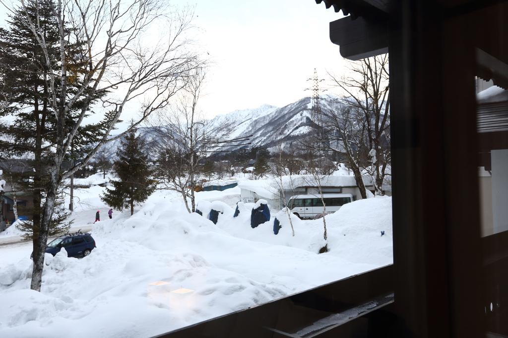 Snowlines Lodge Hakuba Habitación foto