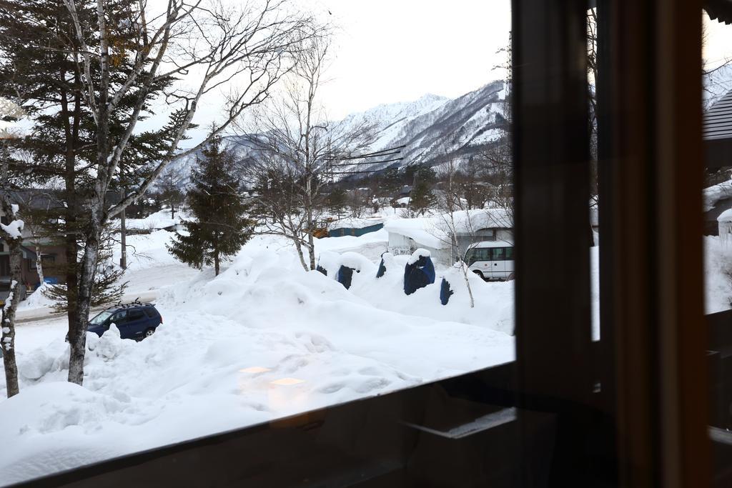 Snowlines Lodge Hakuba Habitación foto