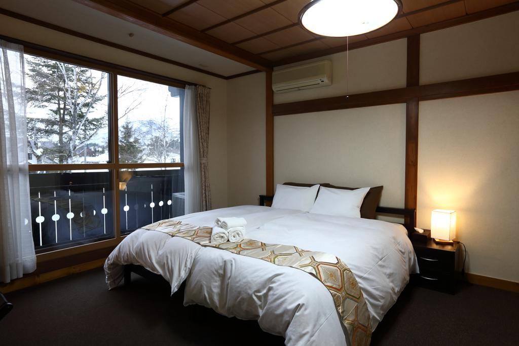 Snowlines Lodge Hakuba Habitación foto
